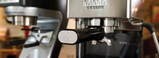 Closeup of the Gaggia Classic Pro with portafilter locked into the brew group