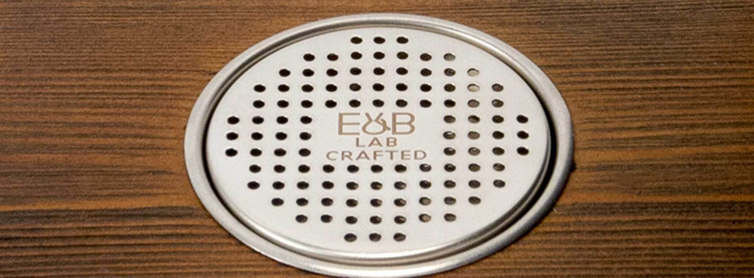 An E&B Lab crafted drip tray, part of a pour over coffee brewing set.
