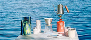 Outdoor pour over brewing on the water with Beaned Up coffee from Whole Latte Love.