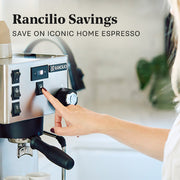 Rancilio Silvia espresso machine brewing a cup of coffee with promotional text that says "Rancilio Savings".