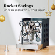 Rocket Appartamento Espresso machine in black with 'Rocket Savings' text on a light background and wooden counter.