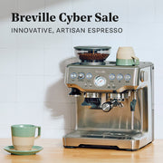 Breville espresso machine on a kitchen counter with 'Breville Cyber Sale' text above.