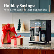 Gaggia Accademia in Black Glass on a marble counter with 2 gifts next to it advertising free gifts with purchase promotion.