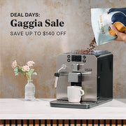 Person pouring Whole Latte Love Crema Wave coffee beans into a silver Gaggia Brera Espresso Machine on a white counter next to pink flowers in front of a brown wall. Promotional text overlayed that reads "Deal Days: Gaggia Sale - Save up to $140 Off".