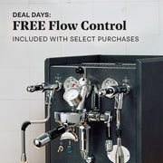 ECM Synchronika II in Anthracite with flow control on a white tiled background. Promotional text overlayed that reads "Deal Days: FREE Flow Control included with select purchases."
