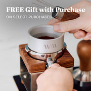Person using a Wiedemann tamping station with promotional text overlayed that reads "FREE Gift with purchase on select purchases".