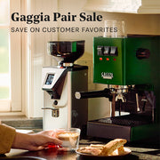 Gaggia Classic Pro E24 in Green next to a Gaggia MDF 55 with a person holding a latte on a counter. Promotional text overlayed that reads "Gaggia Pair Sale - Save on customer favorites".