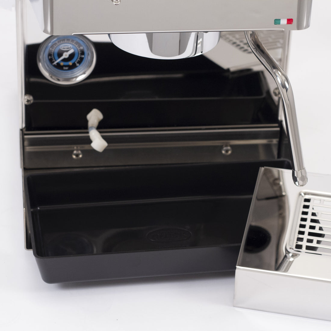 The solenoid relief tube drains directly into the drip tray.