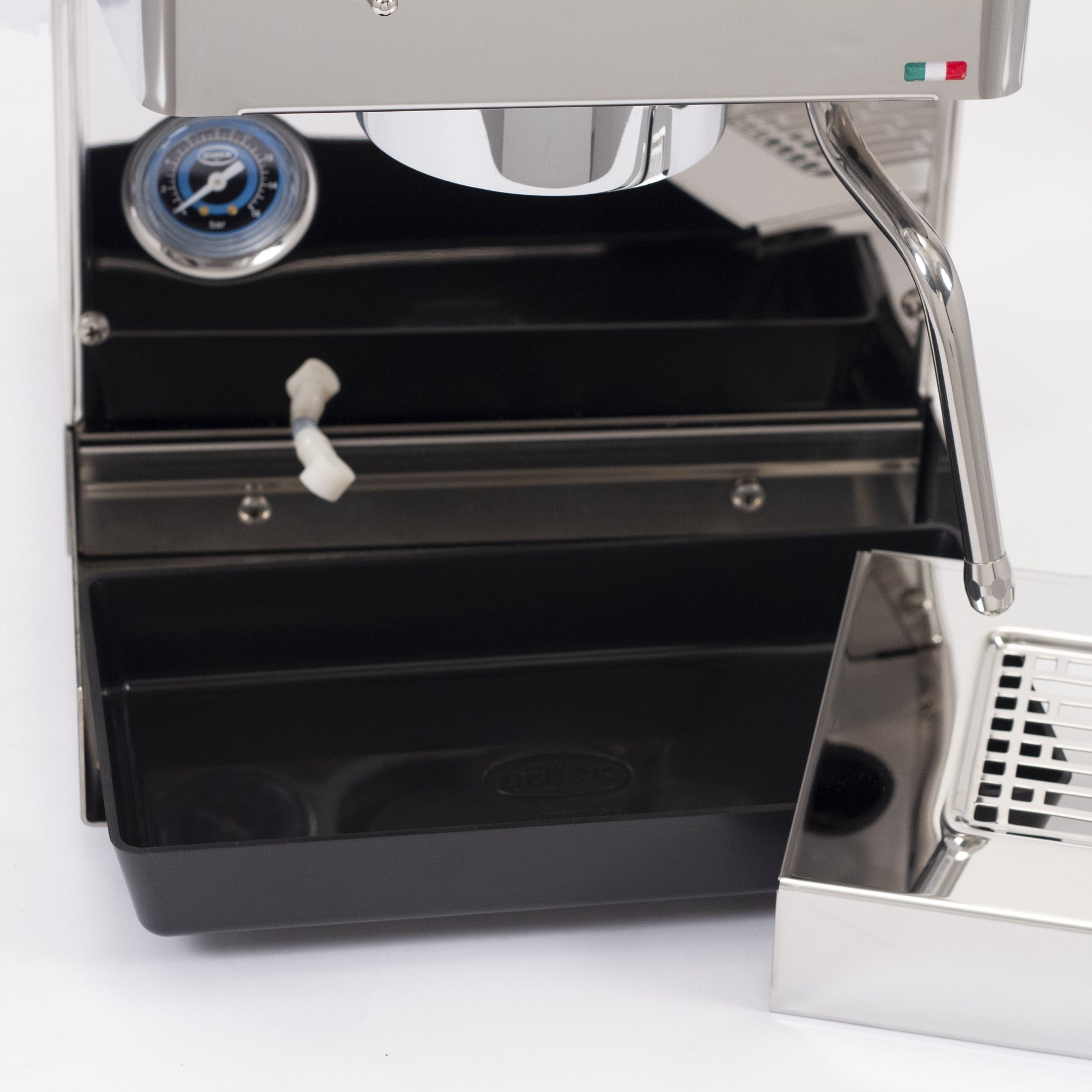 The solenoid relief tube drains directly into the drip tray.