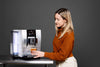 Kristen gazes longingly at the Jura Z10 as it prepares her cold brew.