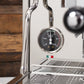 Black steam and brew pressure gauges are a Whole Latte Love custom design element.