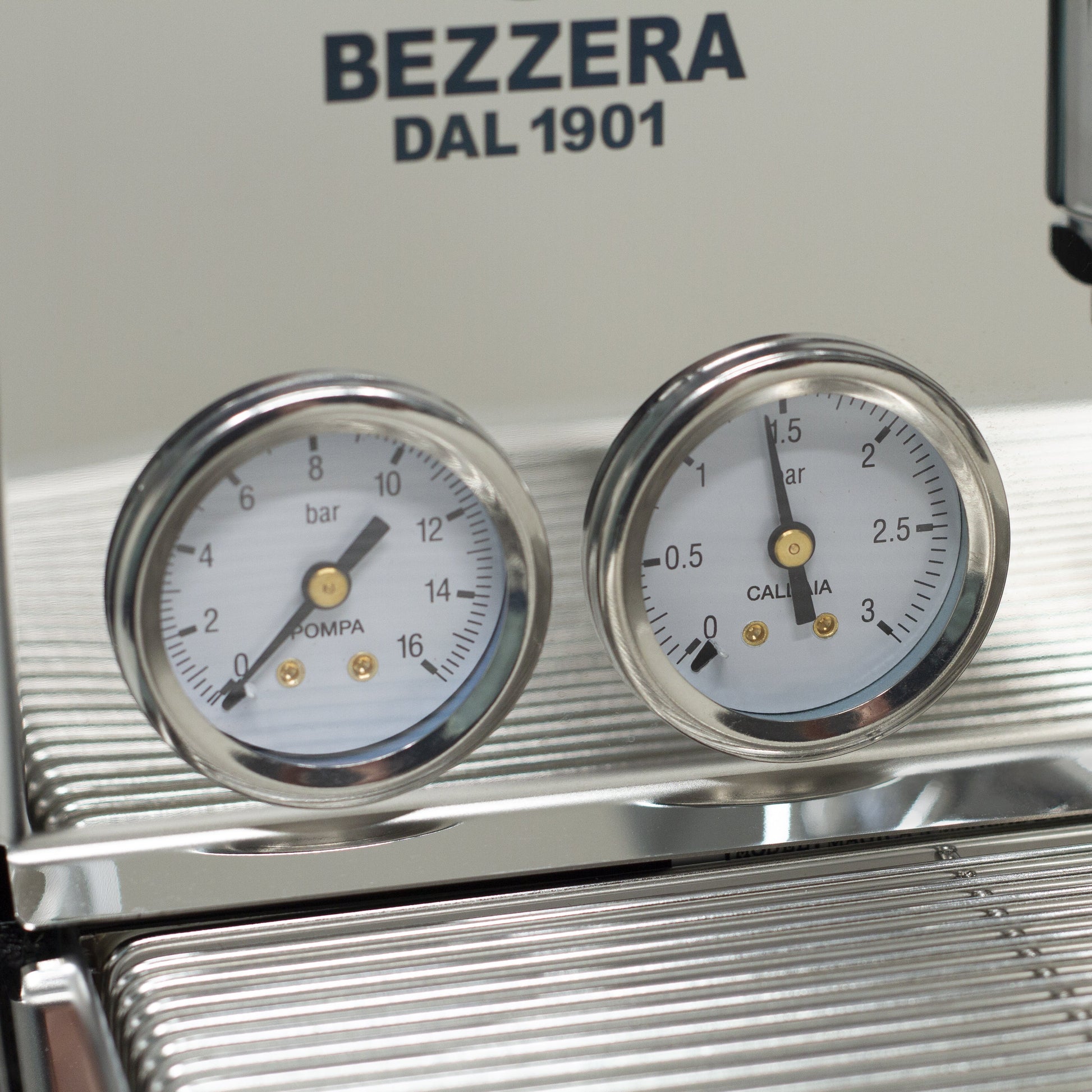 Dual brew and steam pressure gauges.