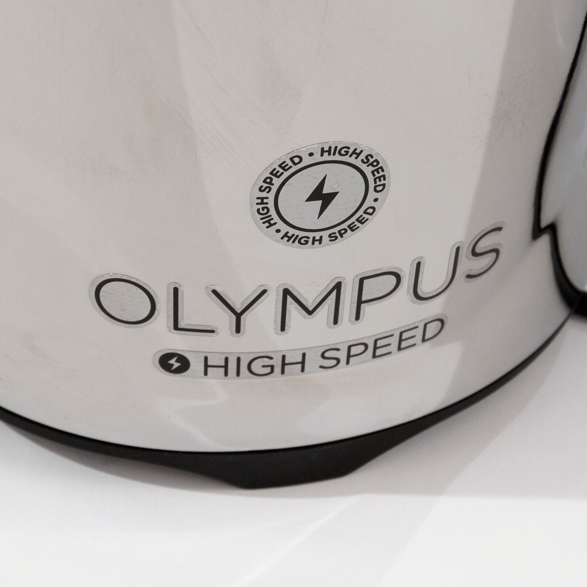"OLYMPUS HIGH SPEED" logo on the base